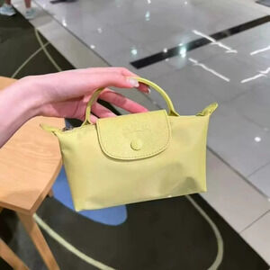 LONGCHAMP Handbag Crafted with French Savoir-faire